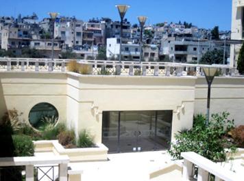The balcony of the Jacir Palace Hotel overlooking the Deheishe Refugee Camp near Bethlehem