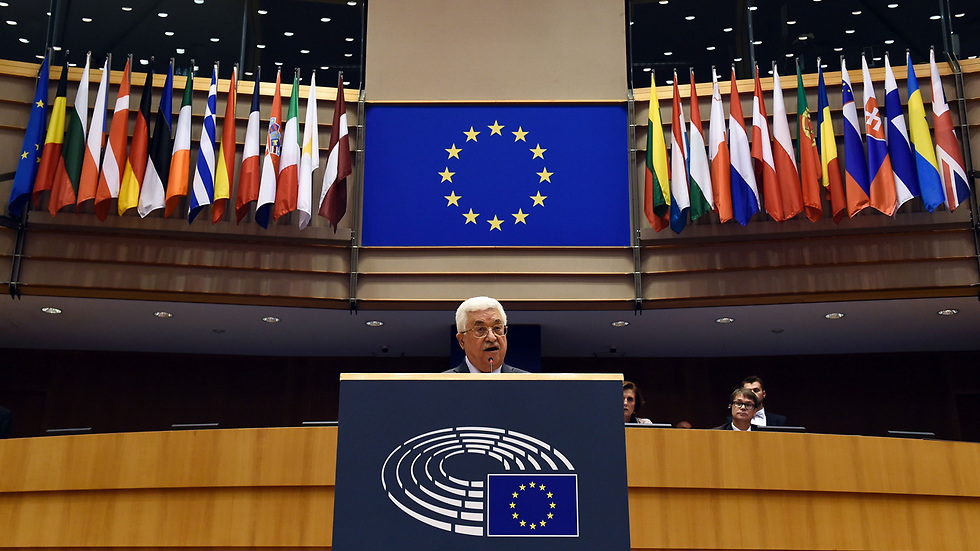 PA President speaking before EU Parliament and alleging rabbis and Israeli government poison Palestinians (Photo: AFP) (Photo: AFP)